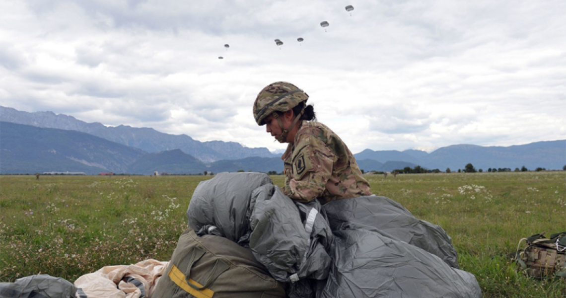 Kristina Noel Donahue in field with tarps